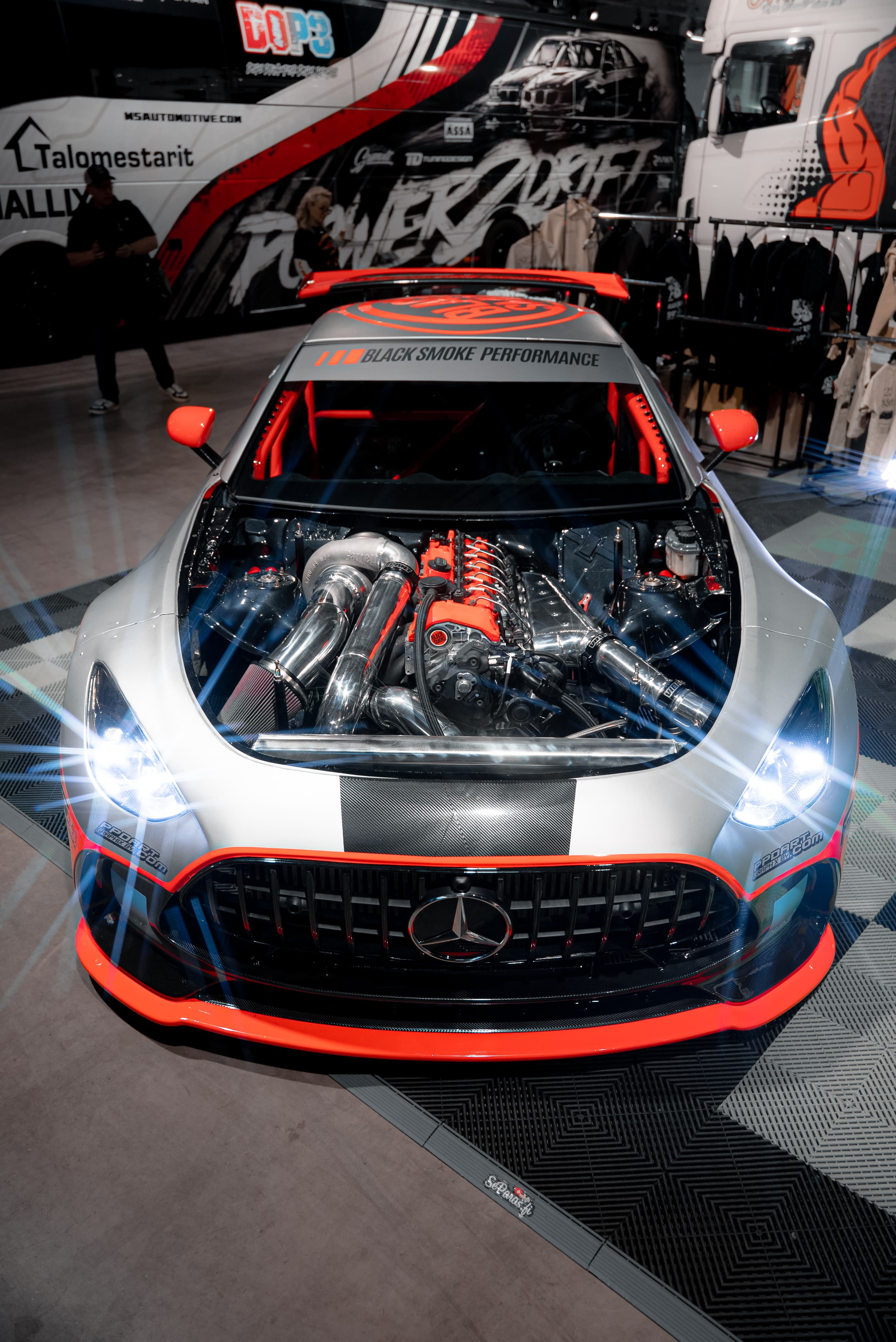 Black Smoke Racing × AMEXCI